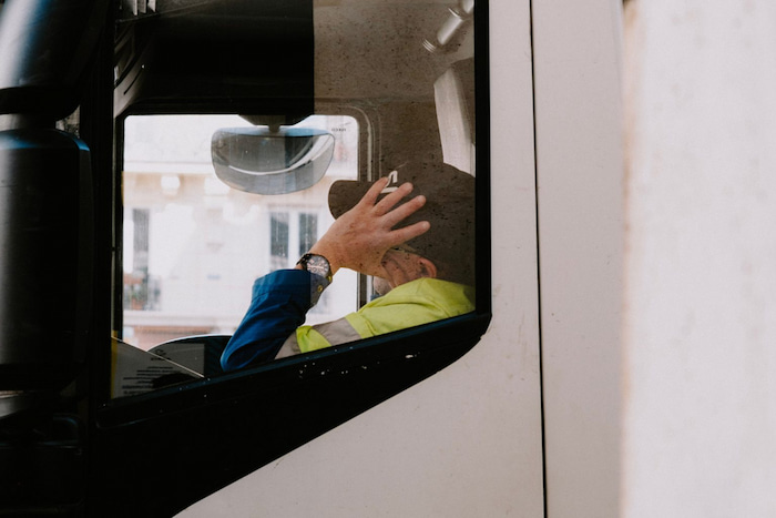Truck driver taking a nap in seat