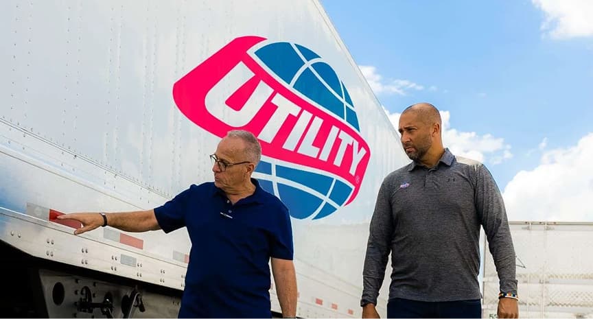 Utility Trailer with two people looking at it